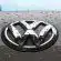 water dew on silver Volkswagen car emblem